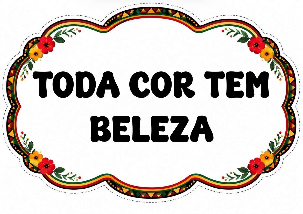 Plaquinha “Toda cor tem beleza” em letras pretas, com fundo branco e borda floral colorida de contorno ondulado.